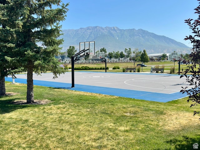 214 W Whitewater Dr, Vineyard, UT 84059 - view of sport court with a lawn, a mountain view, and community basketball court