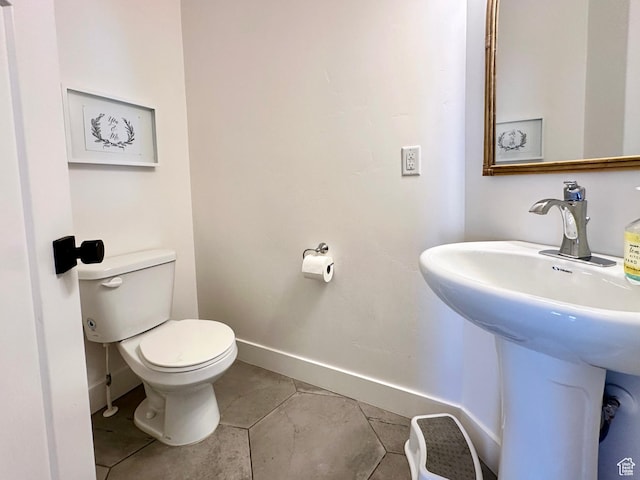 214 W Whitewater Dr, Vineyard, UT 84059 - half bathroom featuring toilet and tile patterned flooring