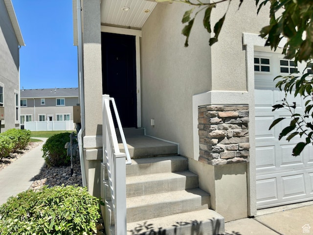 214 W Whitewater Dr, Vineyard, UT 84059 - doorway to property featuring stone siding and stucco siding