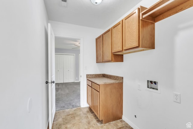985 W 2675 S, Nibley, UT 84321 - laundry area featuring cabinet space, washer hookup, and stone finish floors
