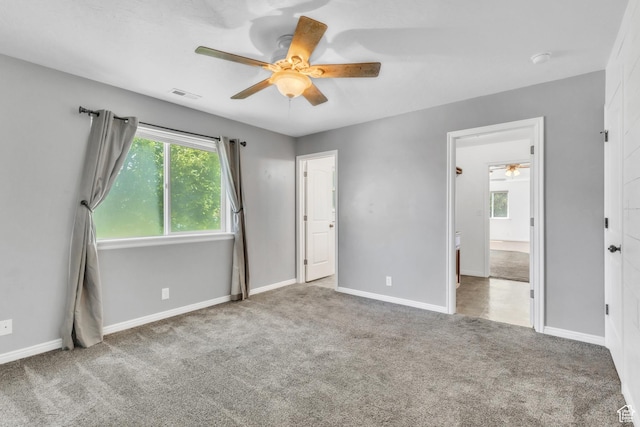 985 W 2675 S, Nibley, UT 84321 - unfurnished bedroom featuring carpet floors, ensuite bathroom, and a ceiling fan