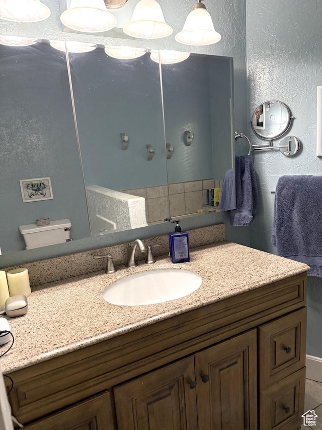 90 W Cherry St W, Grantsville, UT 84029 - bathroom with vanity and a textured wall
