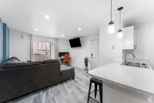 1196 E Waterside Cv S Unit 11, Cottonwood Heights, UT 84047 - living room with recessed lighting and baseboards