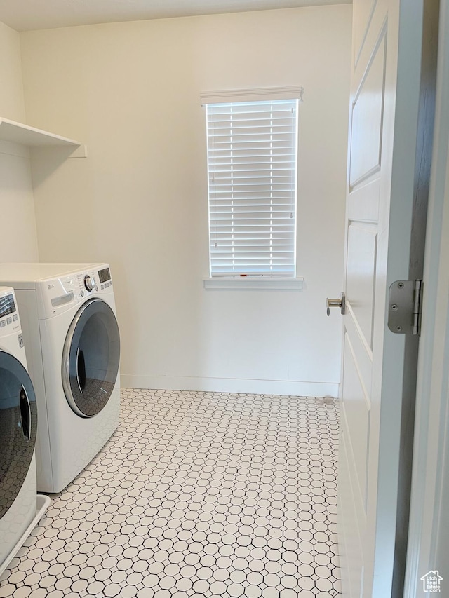 63 E Rose Way, Vineyard, UT 84059 - laundry area featuring washer and clothes dryer and baseboards