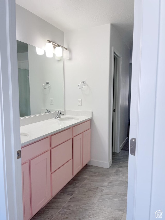 63 E Rose Way, Vineyard, UT 84059 - bathroom with double vanity and baseboards