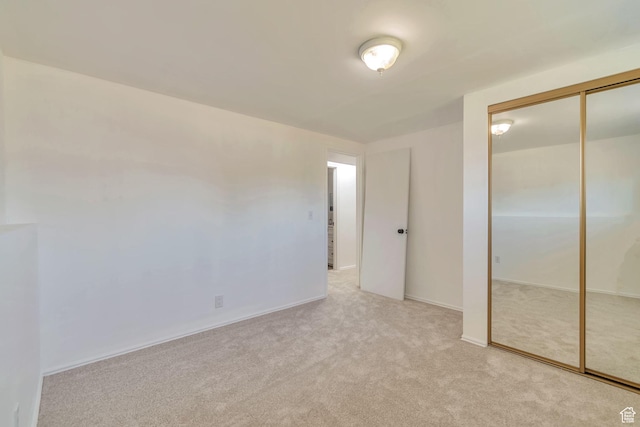 1241 W 4505 S, Taylorsville, UT 84123 - unfurnished bedroom with carpet floors and a closet