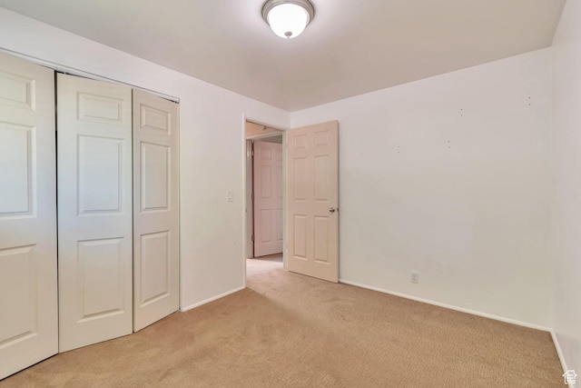 1241 W 4505 S, Taylorsville, UT 84123 - unfurnished bedroom with light colored carpet and a closet