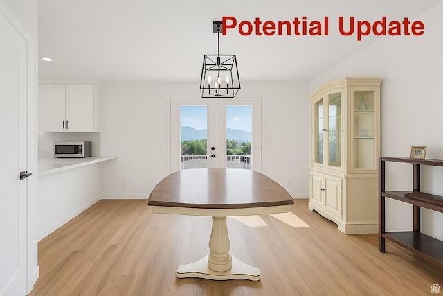 1252 N 100 E, American Fork, UT 84003 - unfurnished dining area featuring french doors, light wood finished floors, recessed lighting, and a chandelier