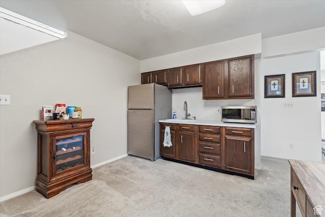 1252 N 100 E, American Fork, UT 84003 - kitchen featuring freestanding refrigerator, stainless steel microwave, and light carpet