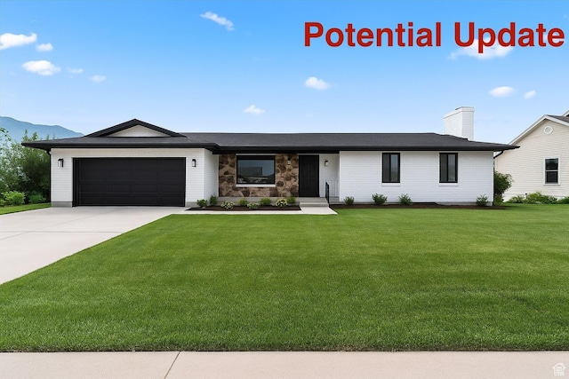 1252 N 100 E, American Fork, UT 84003 - view of front facade featuring a front yard, a garage, driveway, and a chimney