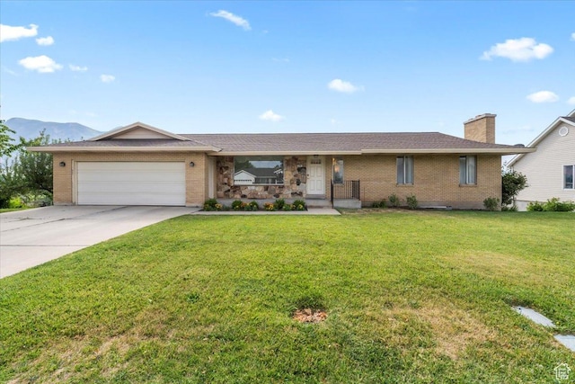 1252 N 100 E, American Fork, UT 84003 - ranch-style house featuring brick siding, an attached garage, a chimney, and driveway