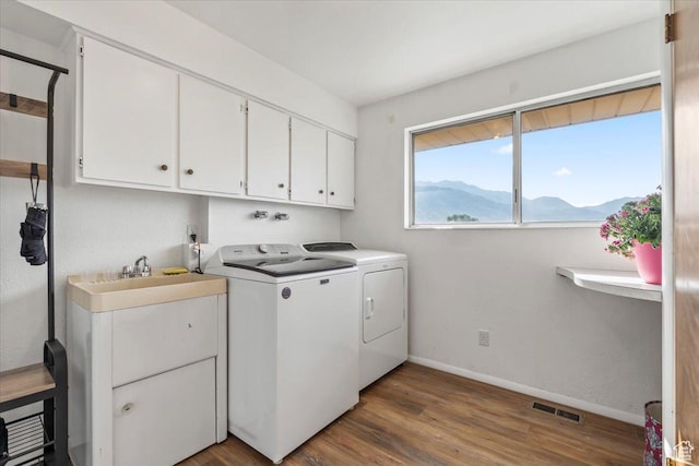 1252 N 100 E, American Fork, UT 84003 - washroom with cabinet space, independent washer and dryer, wood finished floors, and a mountain view