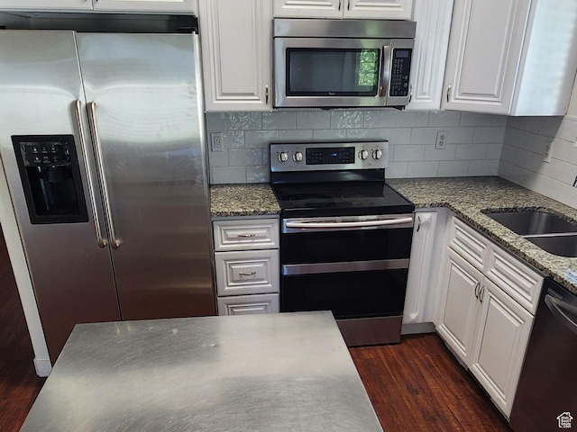 747 W 1580 N, Clinton, UT 84015 - kitchen with appliances with stainless steel finishes, white cabinets, and dark wood-style flooring