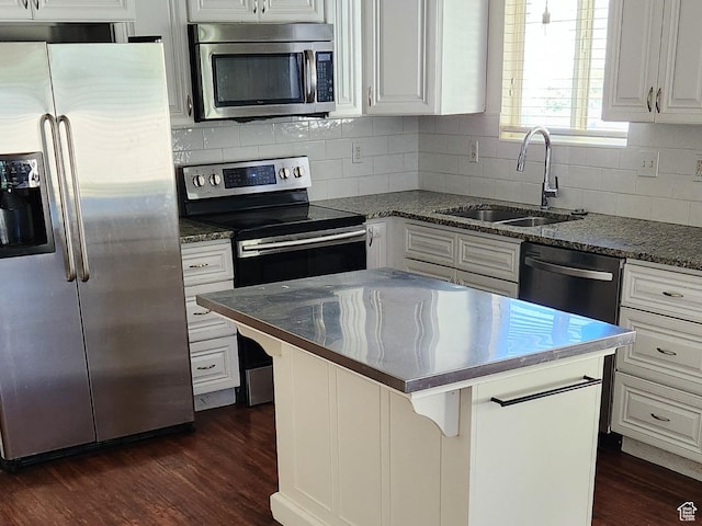 747 W 1580 N, Clinton, UT 84015 - kitchen featuring stainless steel appliances, dark wood finished floors, white cabinetry, and a kitchen island