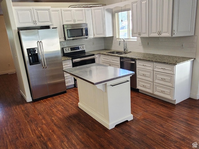 747 W 1580 N, Clinton, UT 84015 - kitchen featuring stainless steel appliances, white cabinets, dark wood-style floors, and tasteful backsplash