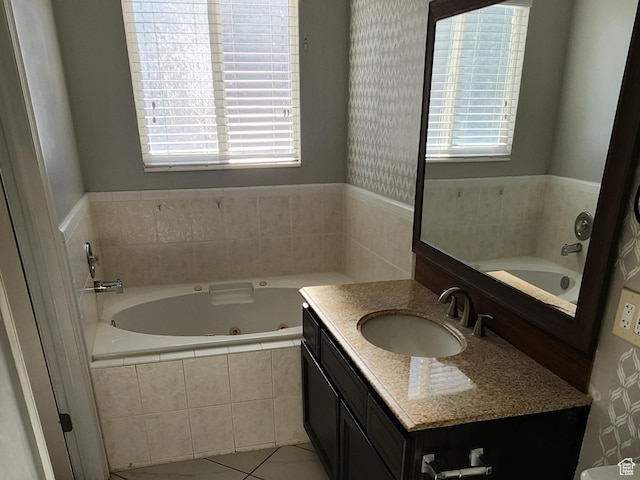 747 W 1580 N, Clinton, UT 84015 - full bath featuring vanity, a jetted tub, plenty of natural light, and tile patterned flooring