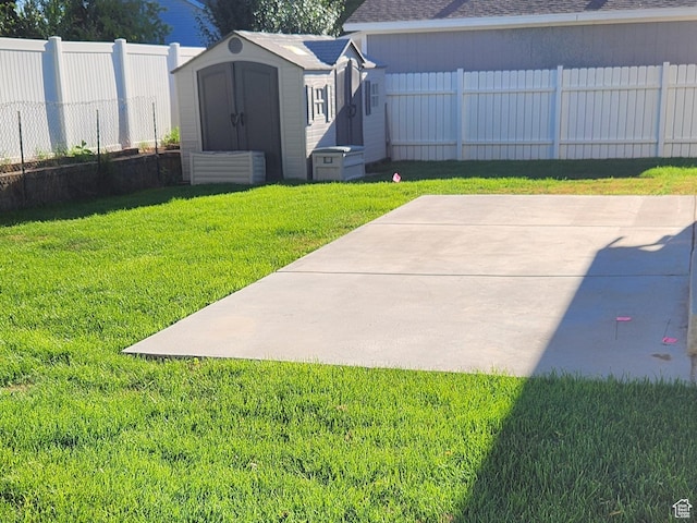 747 W 1580 N, Clinton, UT 84015 - fenced backyard featuring a storage shed and a patio area