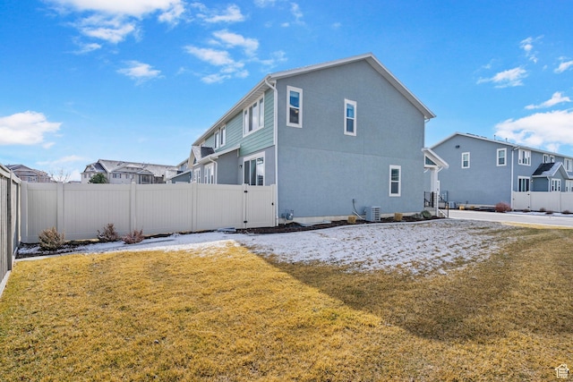 3323 E Gibraltar Ave, Eagle Mountain, UT 84005 - back of property featuring a fenced backyard and a gate