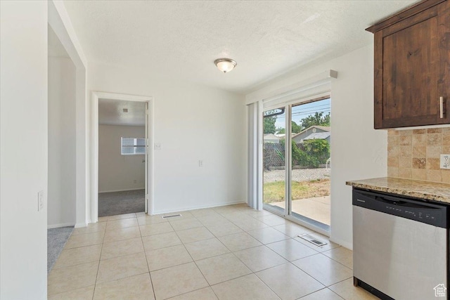 330 W 750 N, Clearfield, UT 84015 - unfurnished dining area featuring a textured ceiling and light tile patterned floors
