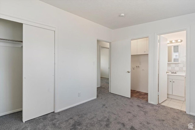 330 W 750 N, Clearfield, UT 84015 - unfurnished bedroom featuring light carpet, ensuite bathroom, and a closet