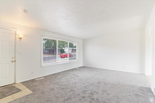 330 W 750 N, Clearfield, UT 84015 - unfurnished living room with carpet and a textured ceiling