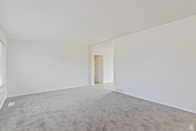 330 W 750 N, Clearfield, UT 84015 - carpeted spare room with a textured ceiling