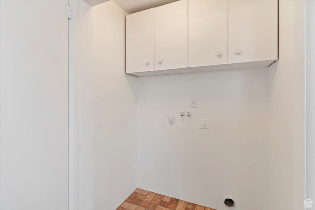 330 W 750 N, Clearfield, UT 84015 - laundry room featuring cabinet space, electric dryer hookup, brick patterned floors, and hookup for a washing machine