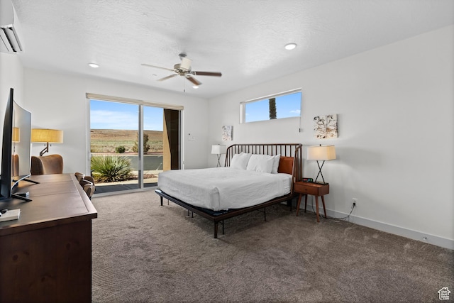 5160 W Villas N Dr N Unit 6-102, Hurricane, UT 84737 - carpeted bedroom featuring an AC wall unit, access to exterior, multiple windows, an office area, and recessed lighting