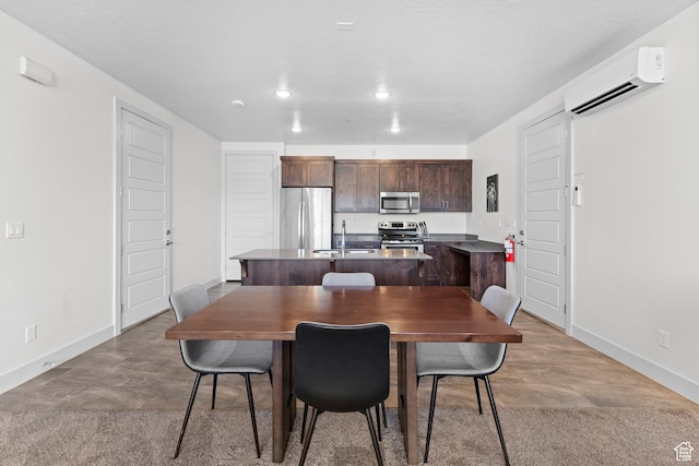 5160 W Villas N Dr N Unit 6-102, Hurricane, UT 84737 - dining room featuring a wall mounted AC, concrete floors, and recessed lighting