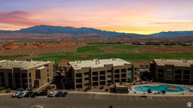 5160 W Villas N Dr N Unit 6-102, Hurricane, UT 84737 - aerial view at dusk of a mountain view, view of pool, and golf course view