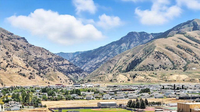 735 E 100 S, Hyrum, UT 84319 - view of mountain backdrop featuring nearby suburban area