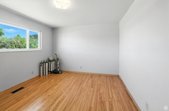 735 E 100 S, Hyrum, UT 84319 - empty room with light wood finished floors