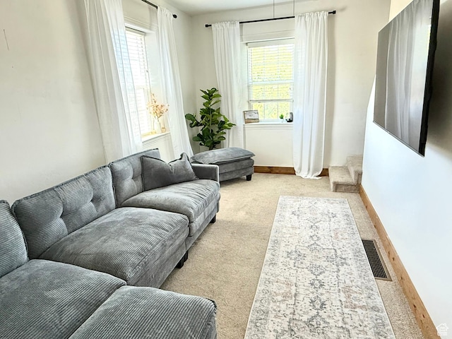 302 W 80 N, Moroni, UT 84646 - carpeted living room with plenty of natural light