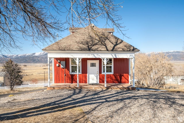302 W 80 N, Moroni, UT 84646 - view of front of property featuring roof with shingles, an outdoor structure, and a mountain view