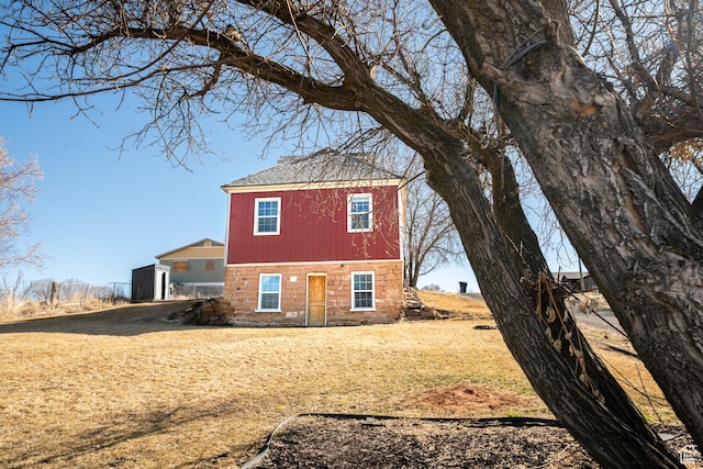 302 W 80 N, Moroni, UT 84646 - back of house with stone siding and a lawn