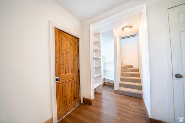 302 W 80 N, Moroni, UT 84646 - hallway with wood finished floors and stairway