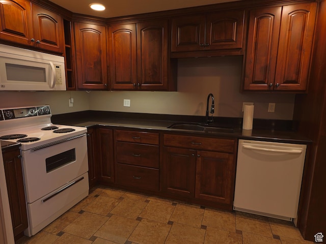 5160 W 5725 S, Hooper, UT 84315 - kitchen with white appliances, dark countertops, light stone finish flooring, and recessed lighting