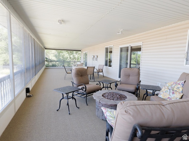 5160 W 5725 S, Hooper, UT 84315 - sunroom / solarium featuring a fire pit, healthy amount of natural light, and carpet floors