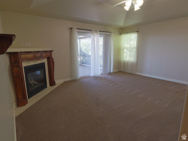 5160 W 5725 S, Hooper, UT 84315 - unfurnished living room with a fireplace with flush hearth, ceiling fan, and carpet flooring