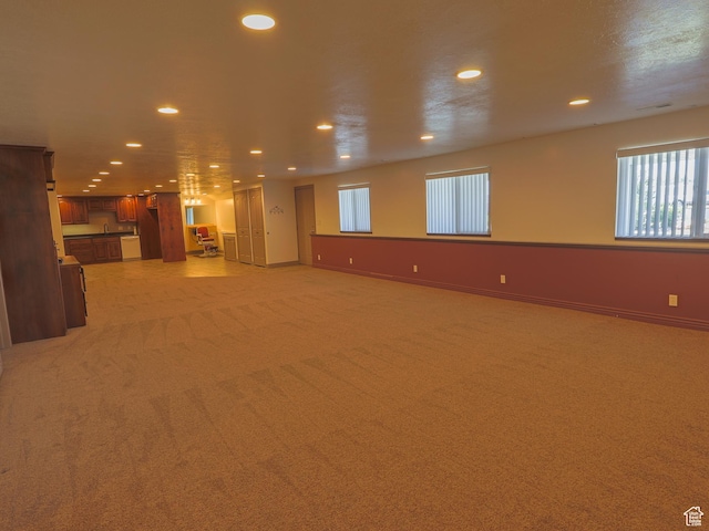5160 W 5725 S, Hooper, UT 84315 - unfurnished living room with recessed lighting and light colored carpet