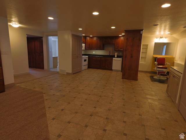 5160 W 5725 S, Hooper, UT 84315 - kitchen featuring white appliances, recessed lighting, dark countertops, and open floor plan