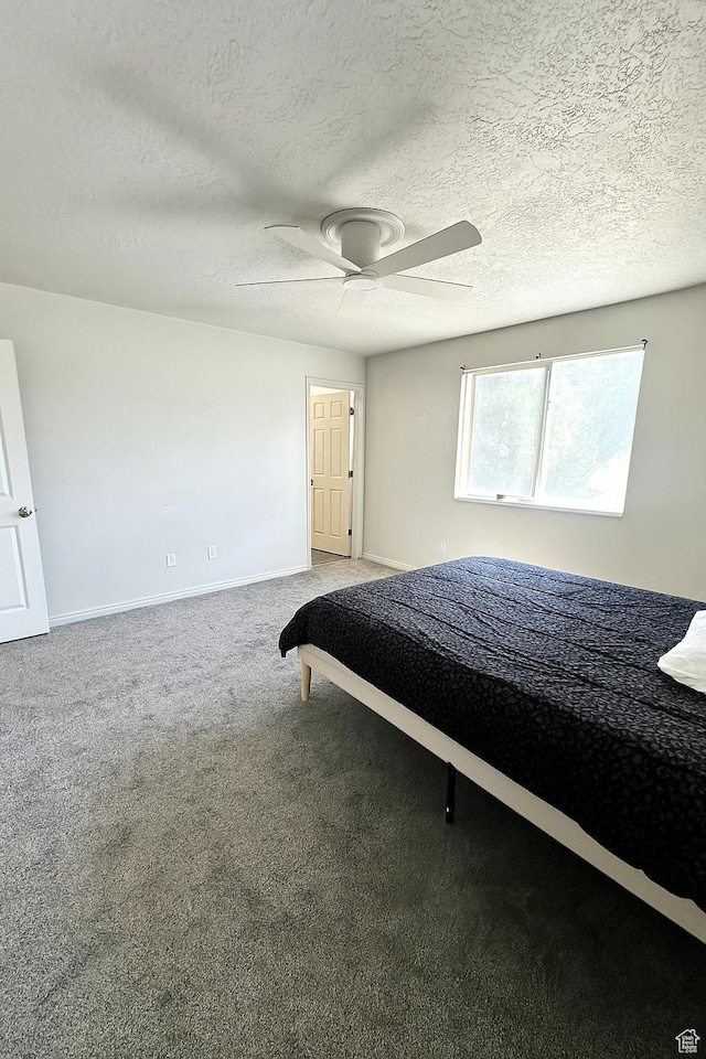 2879 S Fetzer Dr W, Magna, UT 84044 - carpeted bedroom with ceiling fan and a textured ceiling