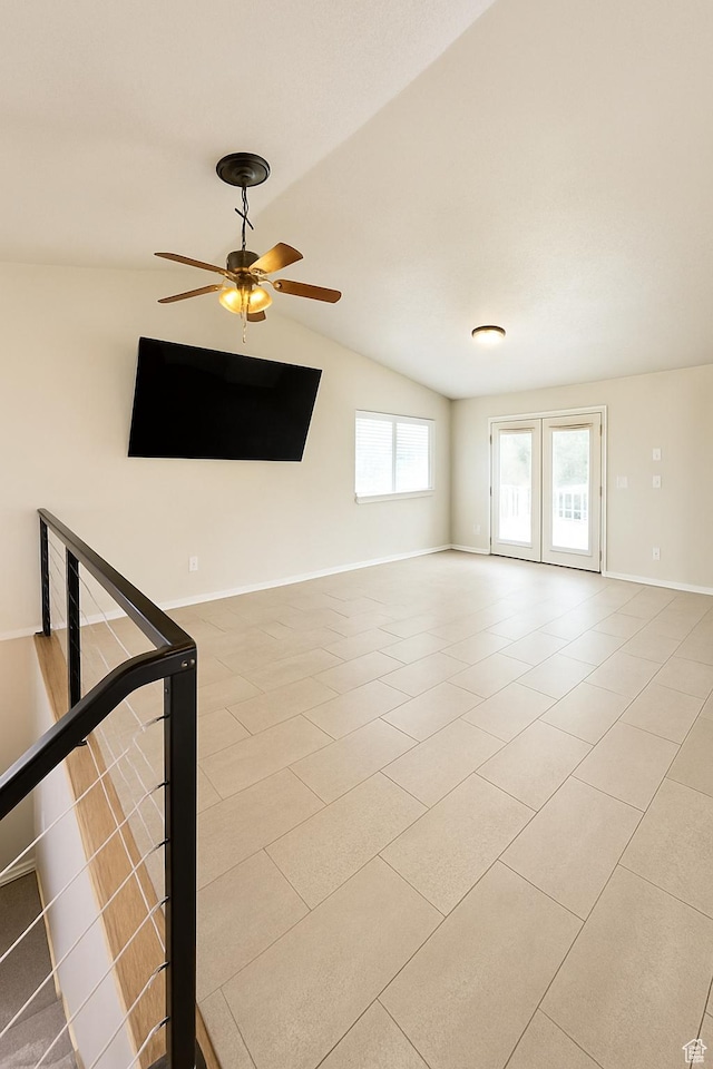 2879 S Fetzer Dr W, Magna, UT 84044 - spare room featuring vaulted ceiling, tile patterned flooring, and ceiling fan
