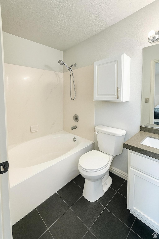 2879 S Fetzer Dr W, Magna, UT 84044 - bathroom featuring vanity, shower / washtub combination, tile patterned flooring, and a textured ceiling