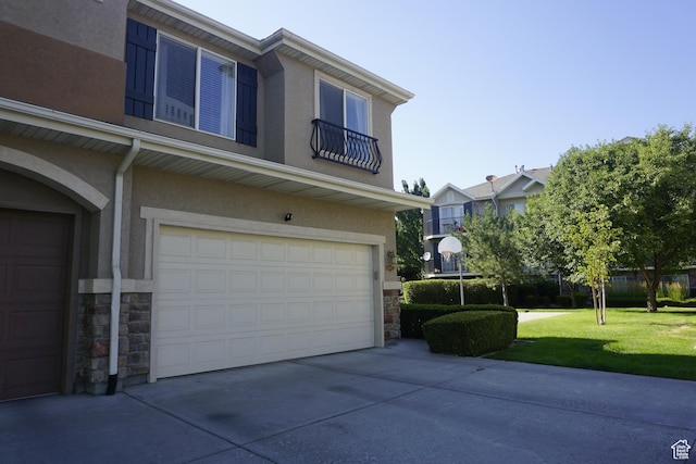 14072 S Julien Cv, Bluffdale, UT 84065 - view of front facade with stone siding, stucco siding, and an attached garage