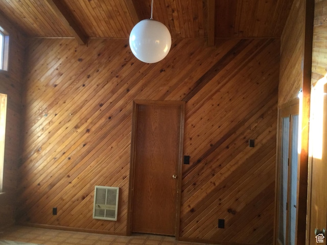 30 N Main St, Aurora, UT 84620 - detailed view of a wood ceiling with exposed beams and wood walls