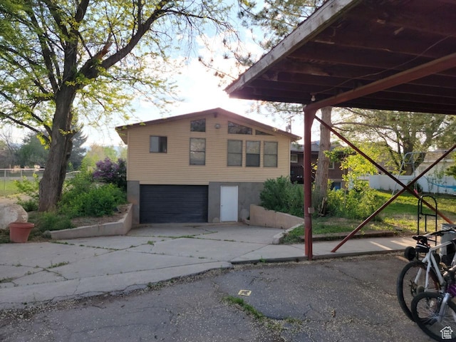 30 N Main St, Aurora, UT 84620 - view of front of home with a garage and concrete driveway