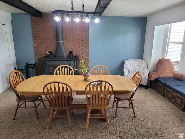 30 N Main St, Aurora, UT 84620 - dining room with light carpet, a textured ceiling, and a wood stove