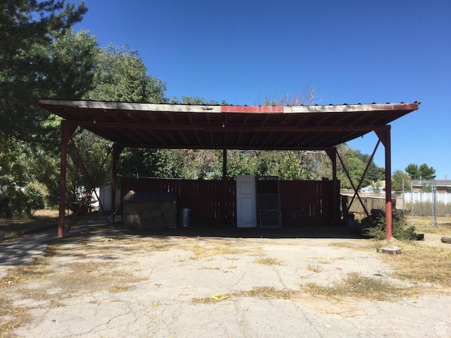 30 N Main St, Aurora, UT 84620 - view of vehicle parking with a detached carport and driveway