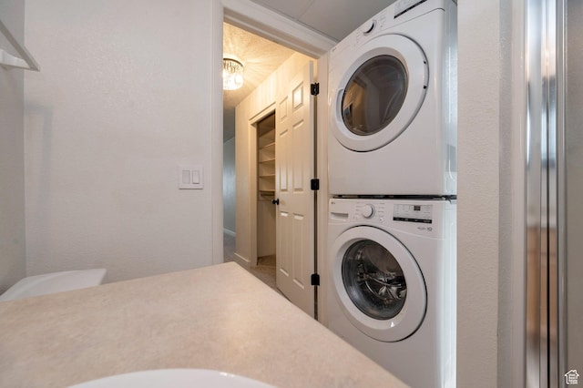 588 E Vine St S Unit 2C, Murray, UT 84107 - laundry area featuring stacked washer / dryer